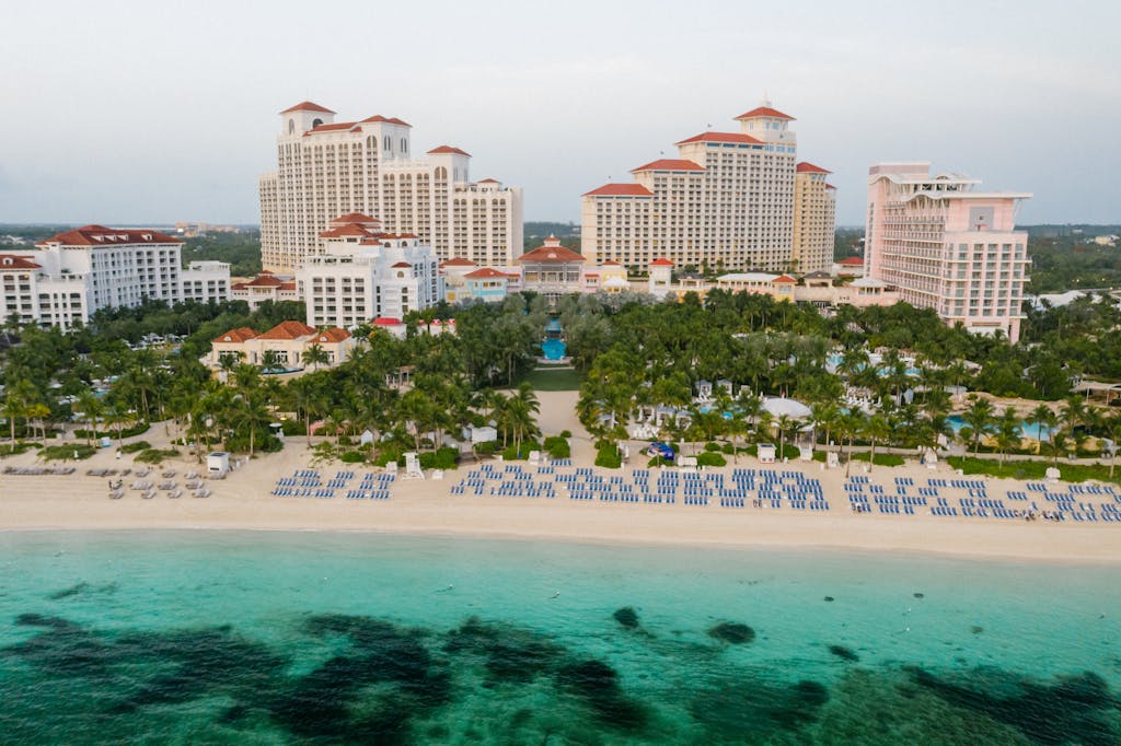 A breathtaking aerial view of a luxury beachfront resort in the Bahamas, perfect for vacations.