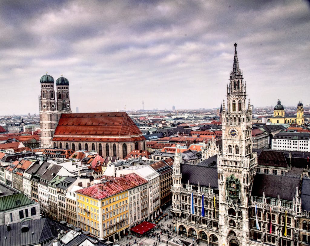 Scenic aerial view of iconic buildings in Munich, Germany, showcasing historical landmarks and architecture.